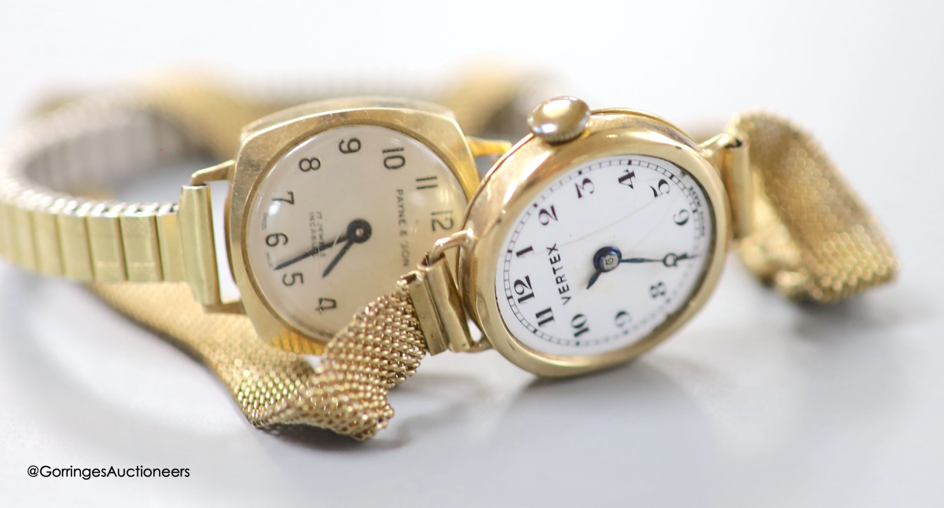 A lady's 9ct gold Vertex manual wind wrist watch, on a rolled gold mesh link bracelet and a similar 9ct gold watch on gold plated flexible bracelet, gross 33 grams.